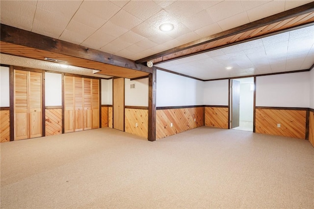 72 Juliane Dr, Gates, NY 14624 - finished basement featuring wood walls, carpet flooring, and a wainscoted wall