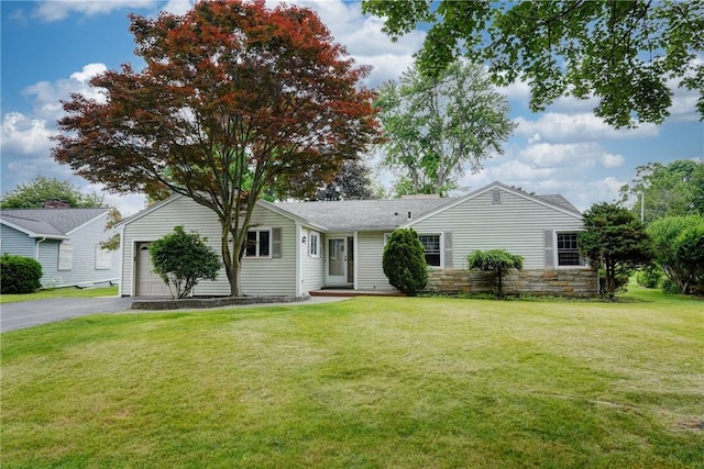 107 Fieldston Ter, Brighton, NY 14610 - ranch-style home featuring stone siding, a front yard, asphalt driveway, and a garage