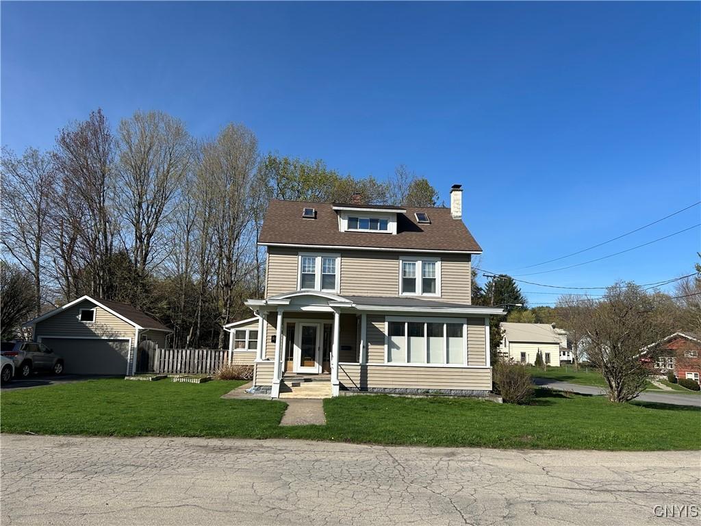 27 Spofford Sq, Manheim, NY 13329 - traditional style home featuring a chimney and an outdoor structure