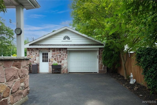 8652 Griffon Ave, Niagara Falls, NY 14304 - garage with asphalt driveway
