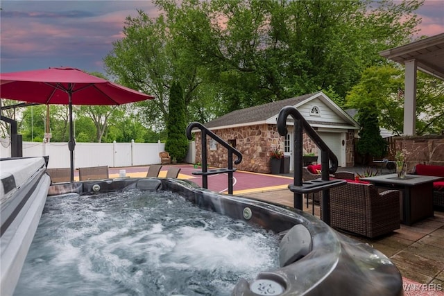 8652 Griffon Ave, Niagara Falls, NY 14304 - fenced backyard featuring a hot tub, an outdoor structure, and a deck