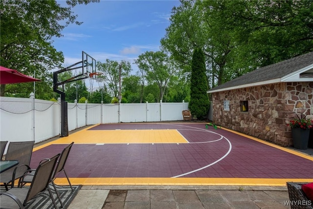 8652 Griffon Ave, Niagara Falls, NY 14304 - view of basketball court featuring basketball court and view of scattered trees