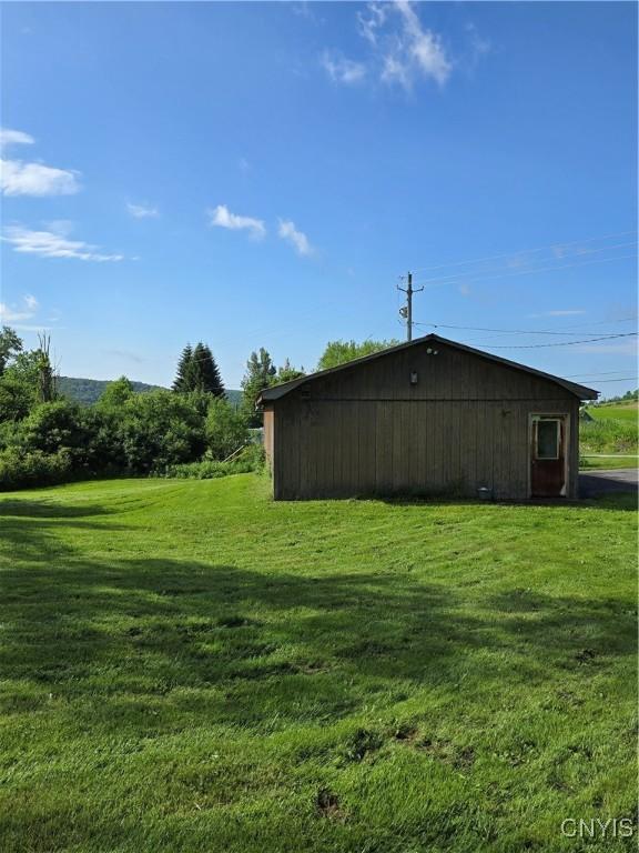 7412 State Highway 51, Plainfield, NY 13491 - view of pole building featuring a lawn