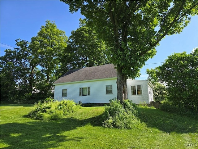 7412 State Highway 51, Plainfield, NY 13491 - view of property exterior with a lawn