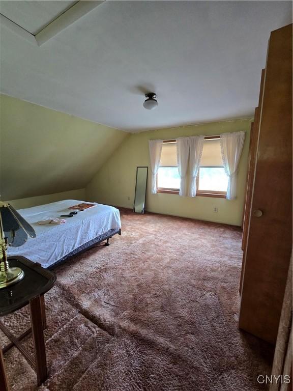 7412 State Highway 51, Plainfield, NY 13491 - bedroom with carpet flooring and lofted ceiling