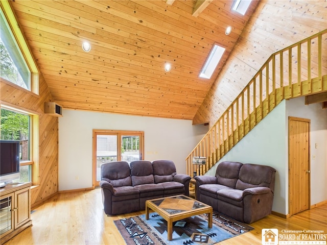 56 Heather Ln, Bradford, PA 16701 - living area featuring high vaulted ceiling, stairway, plenty of natural light, a skylight, and wood ceiling