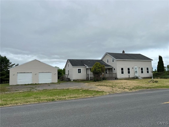 12853 Fuller Rd, Adams, NY 13606 - view of front of property with an outbuilding and a garage