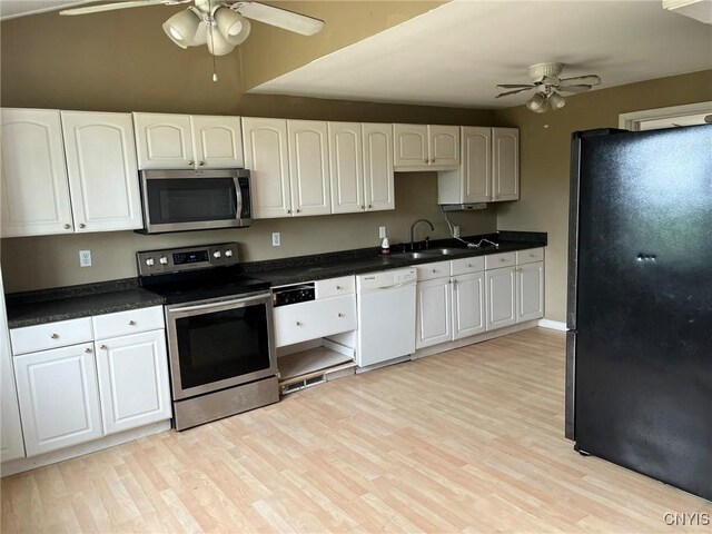 12853 Fuller Rd, Adams, NY 13606 - kitchen with stainless steel appliances, ceiling fan, and light wood-style floors