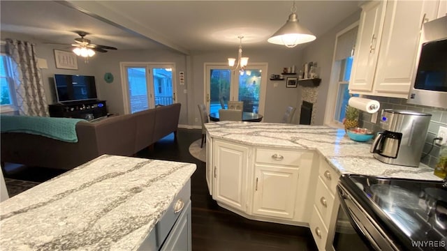 41 Maple Ave, Hamburg, NY 14075 - kitchen featuring open floor plan, appliances with stainless steel finishes, a peninsula, and tasteful backsplash