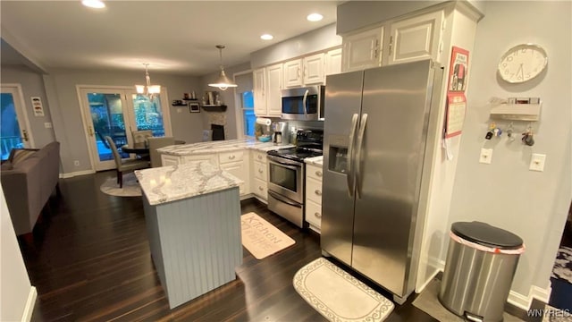 41 Maple Ave, Hamburg, NY 14075 - kitchen featuring stainless steel appliances, a peninsula, white cabinets, dark wood-style flooring, and recessed lighting