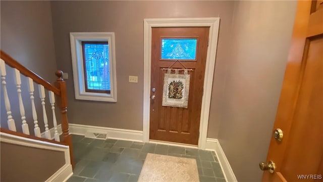 41 Maple Ave, Hamburg, NY 14075 - tiled entryway featuring baseboards and stairs