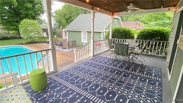 41 Maple Ave, Hamburg, NY 14075 - wooden terrace with outdoor dining area, ceiling fan, a shed, and a patio area