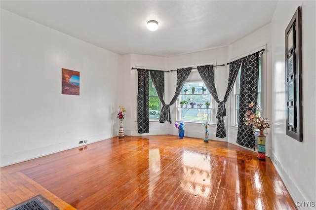 905-07 Tallman St, Syracuse, NY 13204 - empty room with hardwood / wood-style floors and baseboards