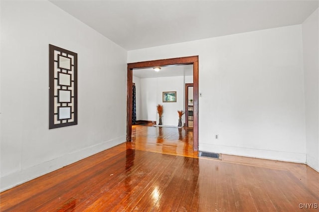 905-07 Tallman St, Syracuse, NY 13204 - empty room featuring wood-type flooring and baseboards