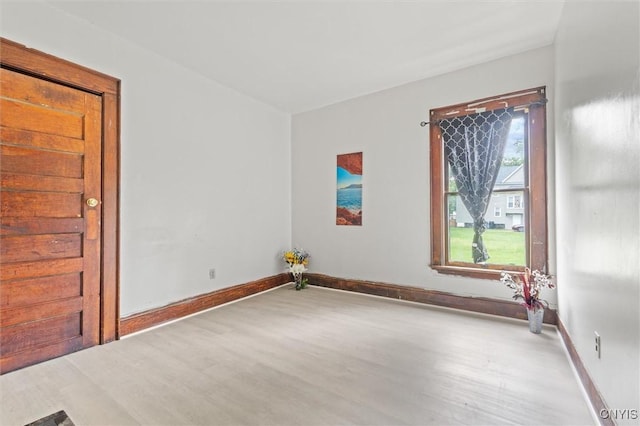 905-07 Tallman St, Syracuse, NY 13204 - spare room with wood finished floors and baseboards