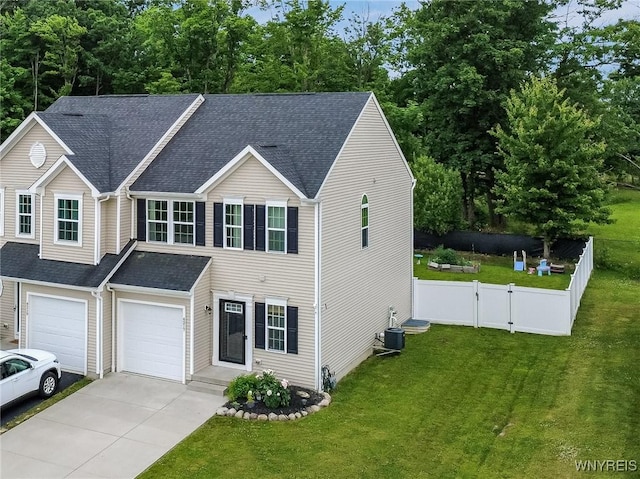 4217 Arthur Ct, Hamburg, NY 14075 - view of front of house featuring driveway, an attached garage, and roof with shingles