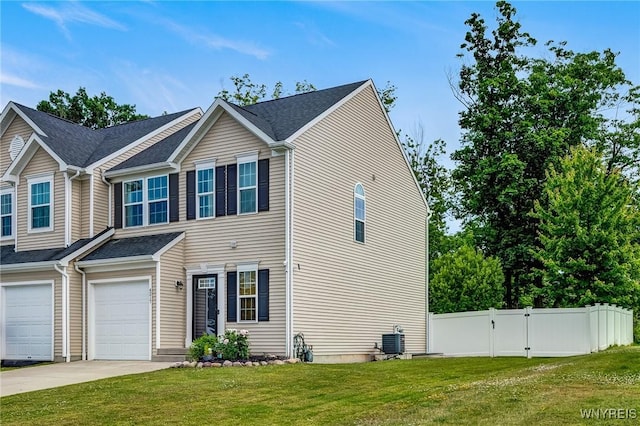 4217 Arthur Ct, Hamburg, NY 14075 - view of front facade featuring an attached garage, driveway, and a gate