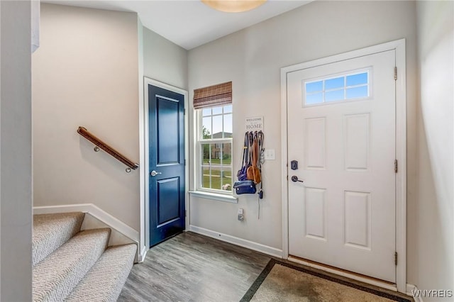 4217 Arthur Ct, Hamburg, NY 14075 - entryway featuring wood finished floors and stairs