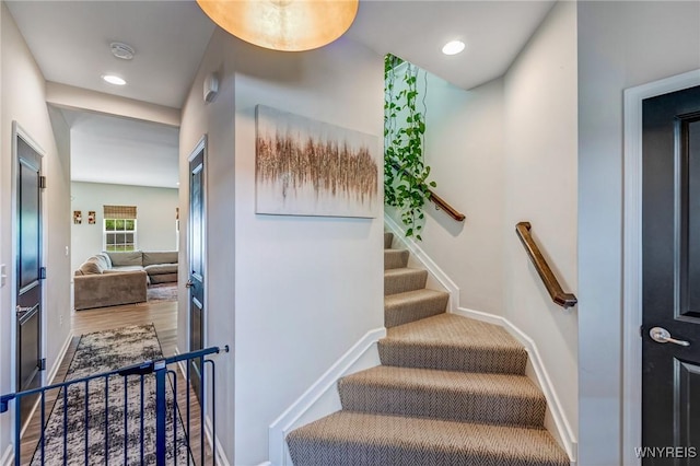 4217 Arthur Ct, Hamburg, NY 14075 - stairway with baseboards and recessed lighting