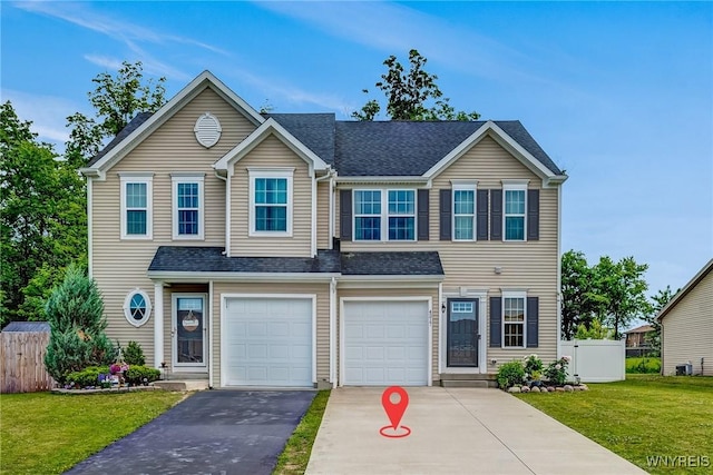 4217 Arthur Ct, Hamburg, NY 14075 - view of front of house with asphalt driveway, a garage, and a shingled roof