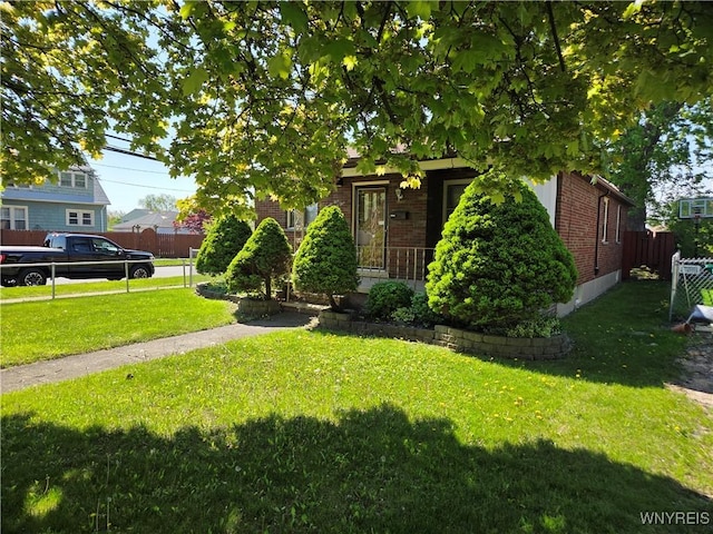 2595 Jerauld Ave, Niagara Falls, NY 14305 - view of property hidden behind natural elements with brick siding