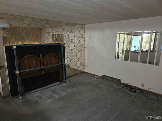 2595 Jerauld Ave, Niagara Falls, NY 14305 - unfurnished living room with carpet floors and baseboards