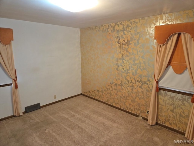 2595 Jerauld Ave, Niagara Falls, NY 14305 - empty room featuring carpet floors and wallpapered walls