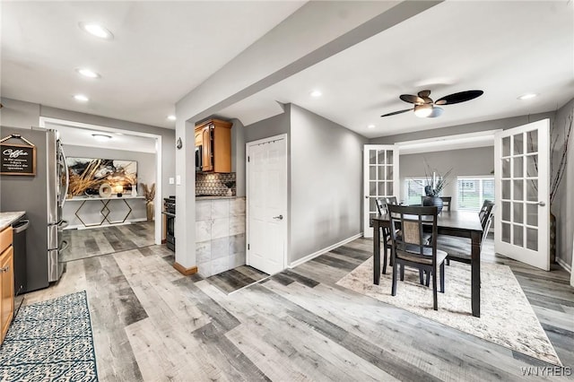48 Meaford Rd, Cheektowaga, NY 14215 - dining space with ceiling fan, light wood-style flooring, recessed lighting, and french doors