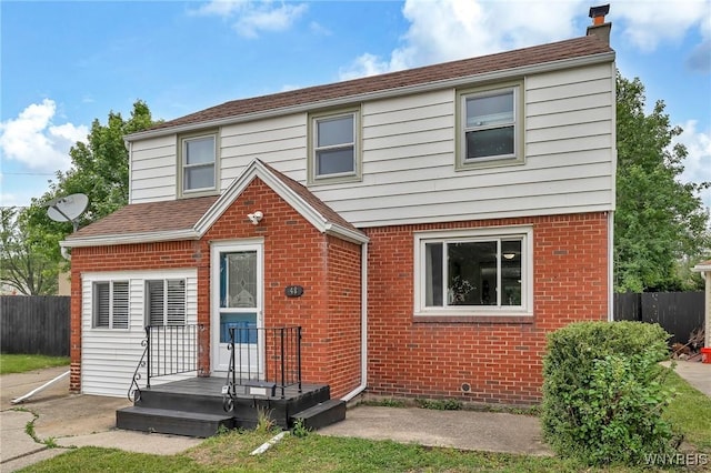 48 Meaford Rd, Cheektowaga, NY 14215 - view of front of home with brick siding and a chimney