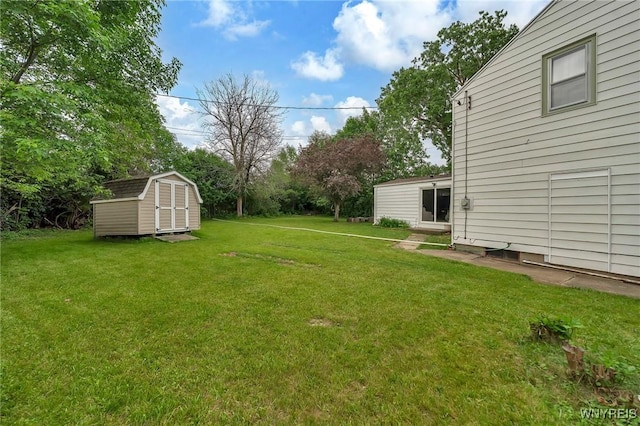 48 Meaford Rd, Cheektowaga, NY 14215 - view of green lawn featuring a shed