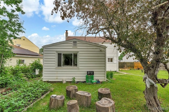 48 Meaford Rd, Cheektowaga, NY 14215 - back of house featuring a chimney