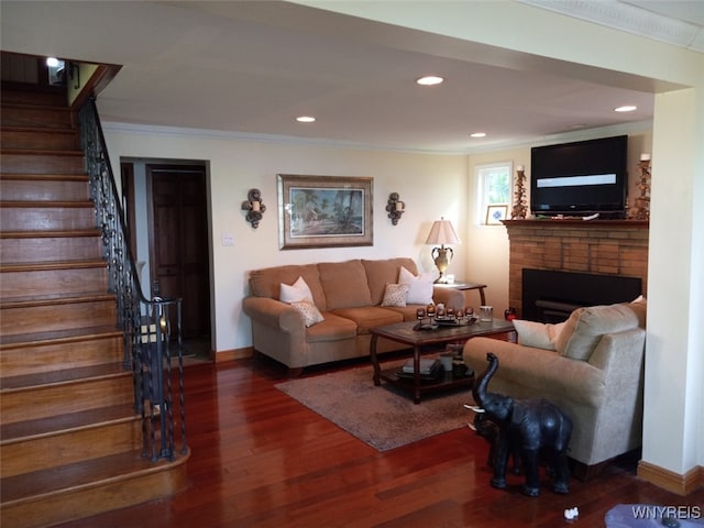 9802 Shorecliff Rd, Evans, NY 14006 - living room with stairway, crown molding, wood finished floors, a fireplace, and recessed lighting