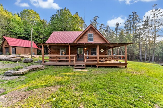661 Lewis Rd, Meredith, NY 13806 - rear view of house featuring log exterior, a lawn, a metal roof, and a deck