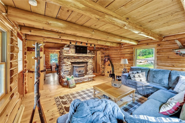 661 Lewis Rd, Meredith, NY 13806 - living room featuring wood-type flooring, a wood ceiling with exposed beams, a fireplace, and rustic walls