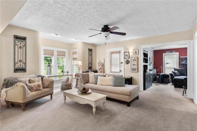 639 Plank Rd, Penfield, NY 14580 - living area with light colored carpet and ceiling fan