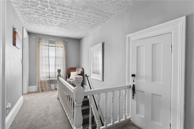 639 Plank Rd, Penfield, NY 14580 - carpeted bedroom featuring a textured ceiling and a nursery area
