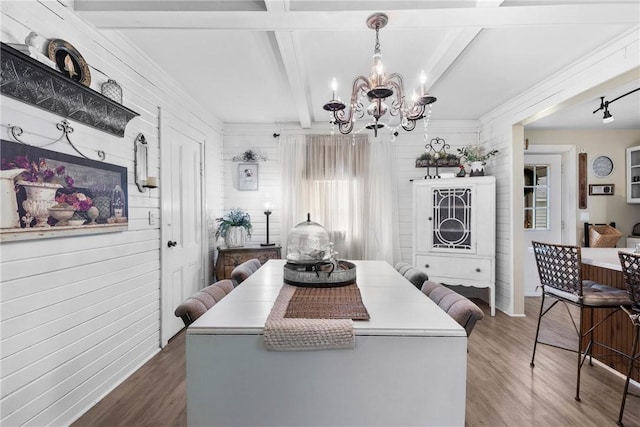 639 Plank Rd, Penfield, NY 14580 - dining space with wood finished floors, a chandelier, beamed ceiling, and wooden walls