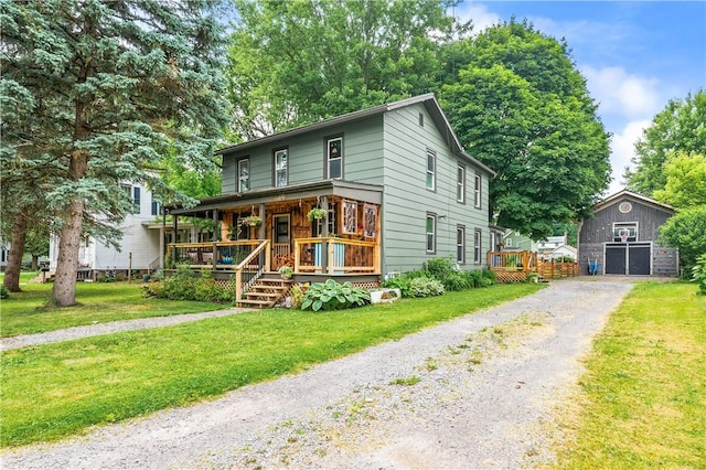 258 E State St, Albion, NY 14411 - view of front of home featuring a porch, a front lawn, and gravel driveway