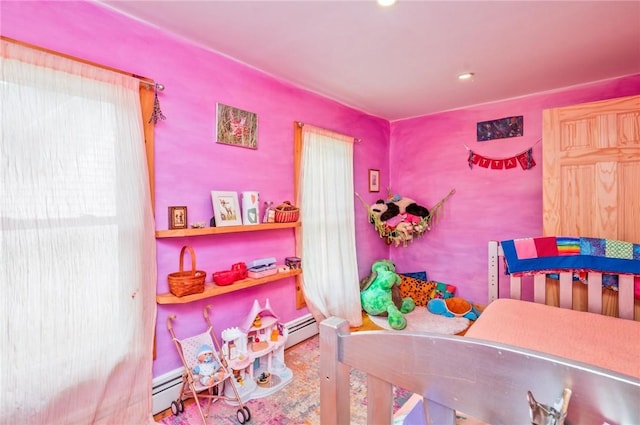 258 E State St, Albion, NY 14411 - bedroom featuring a baseboard radiator