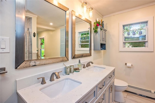 258 E State St, Albion, NY 14411 - bathroom with a baseboard radiator, double vanity, healthy amount of natural light, and ornamental molding