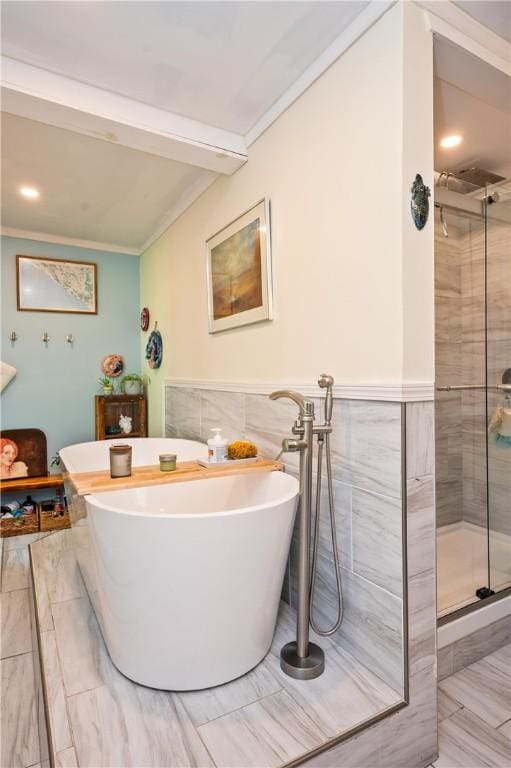 258 E State St, Albion, NY 14411 - full bath with a shower stall, a soaking tub, tile walls, ornamental molding, and wainscoting