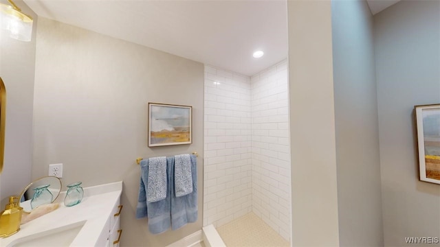 37A Stonham Pl, Amherst, NY 14221 - full bathroom with a tile shower, vanity, and recessed lighting