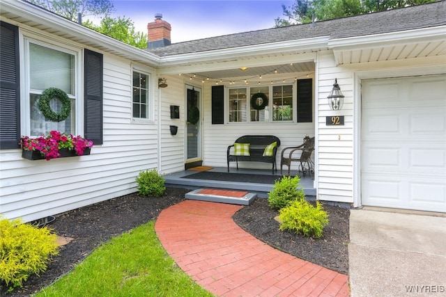 92 Bridle Path, Amherst, NY 14221 - doorway to property with covered porch and a chimney