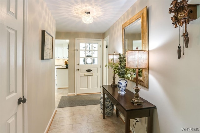 92 Bridle Path, Amherst, NY 14221 - entryway featuring baseboards and light tile patterned flooring