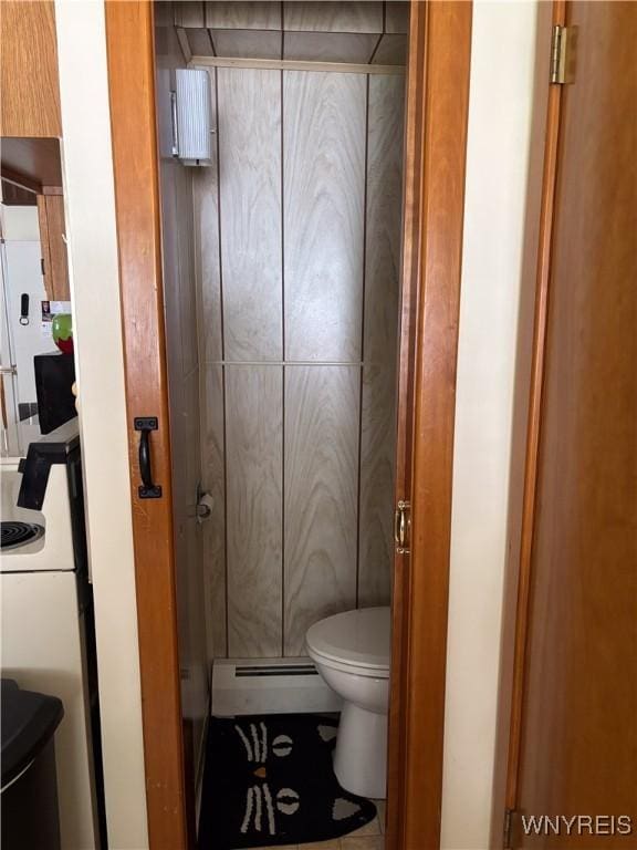 126 N 8th St, Olean-City, NY 14760 - bathroom with baseboard heating and toilet