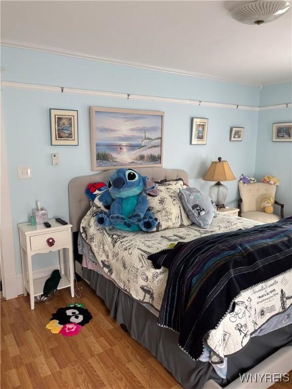 126 N 8th St, Olean-City, NY 14760 - bedroom featuring wood finished floors