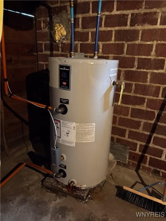 126 N 8th St, Olean-City, NY 14760 - utility room with water heater