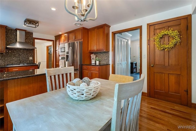20 Dan Troy Dr, Amherst, NY 14221 - dining room featuring a chandelier, wood finished floors, and recessed lighting