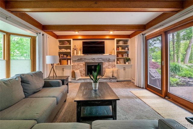 20 Dan Troy Dr, Amherst, NY 14221 - living area featuring beamed ceiling, carpet flooring, a fireplace, and a baseboard radiator