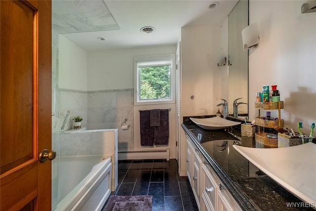 20 Dan Troy Dr, Amherst, NY 14221 - bathroom featuring a baseboard heating unit, a garden tub, double vanity, and tile patterned floors